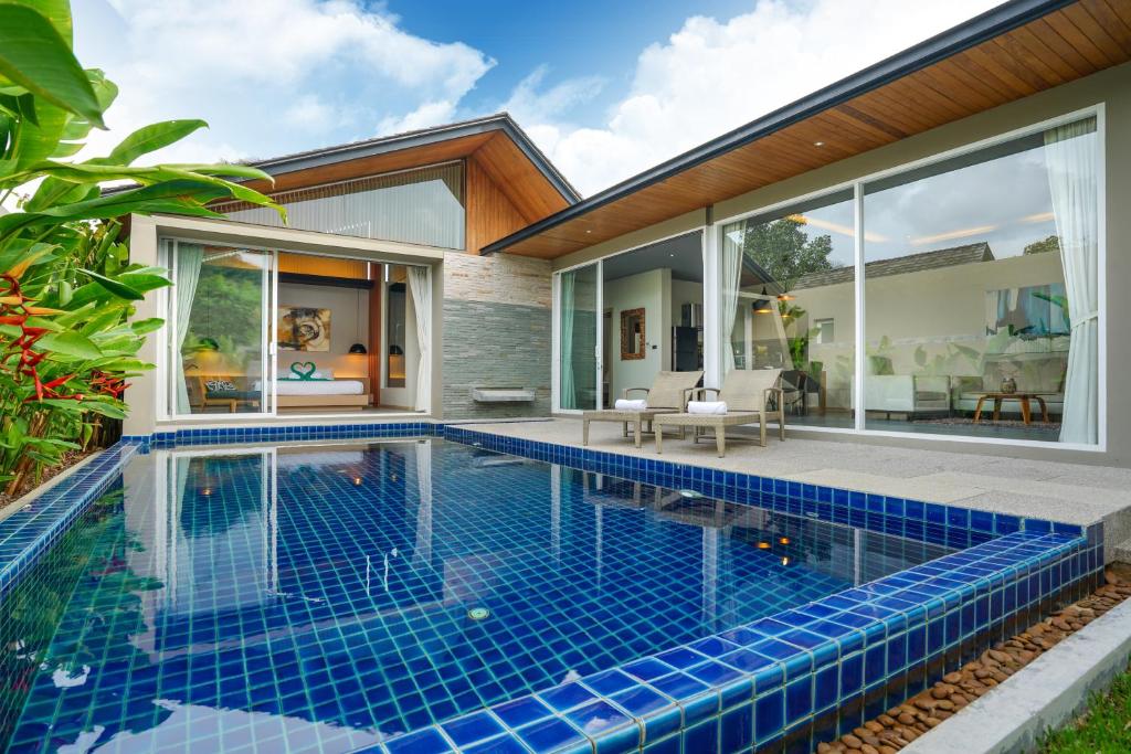 Exterior view of a private pool villa in Layan Beach