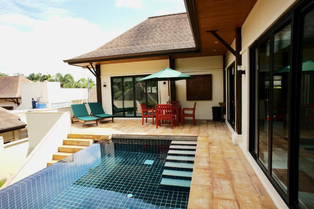 Exterior view of a private pool at Cocktail Palm Villa in Rawai Beach