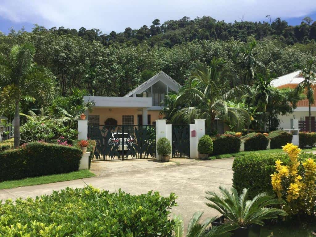 Exterior view with surrounding palm trees at a Luxury Villa in Phuket