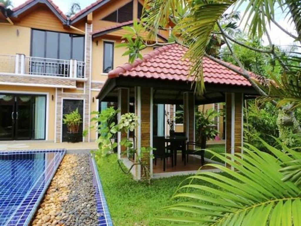 Exterior view of a private pool at Private Villas Bangtao in Bang Tao Beach