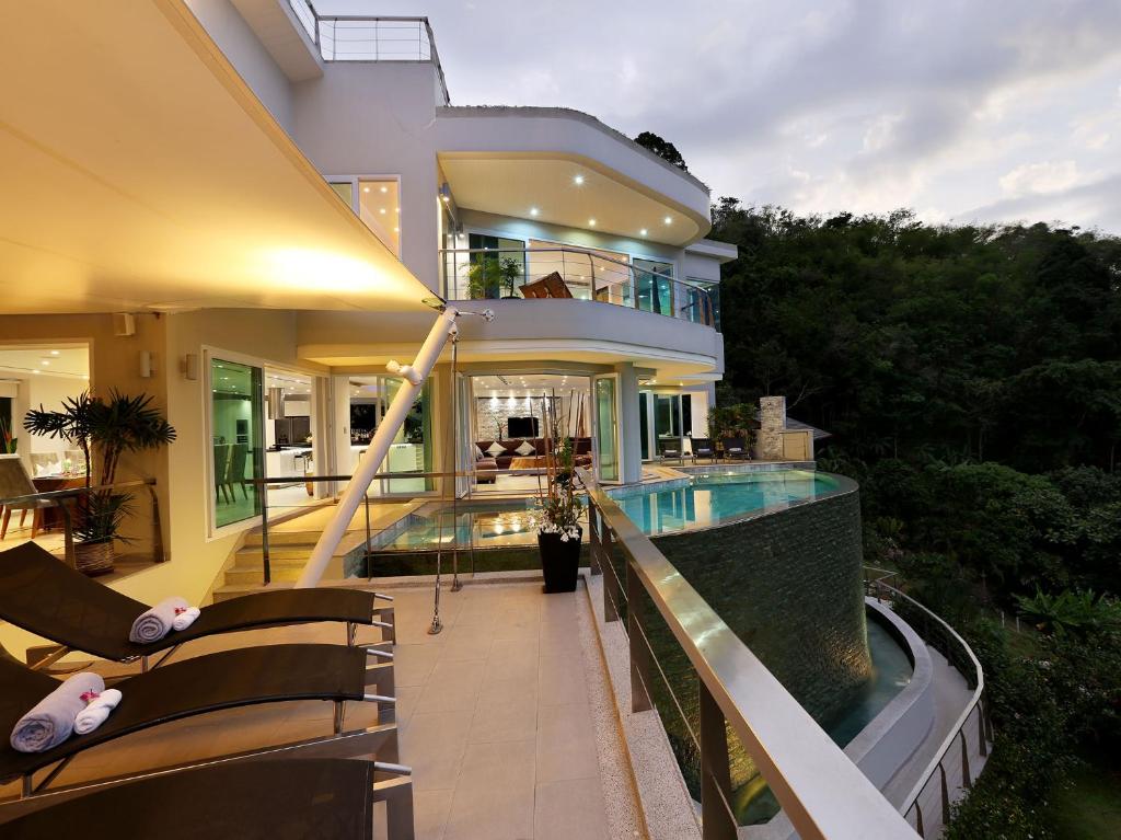 Exterior view of a private pool at Fully Staffed Seaview villa in Bang Tao Beach